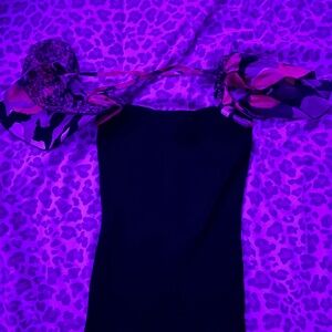 Bebe Y2K stretchy black dress with floral sleeves and strings on back!